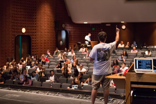 Professor lecturing to students 